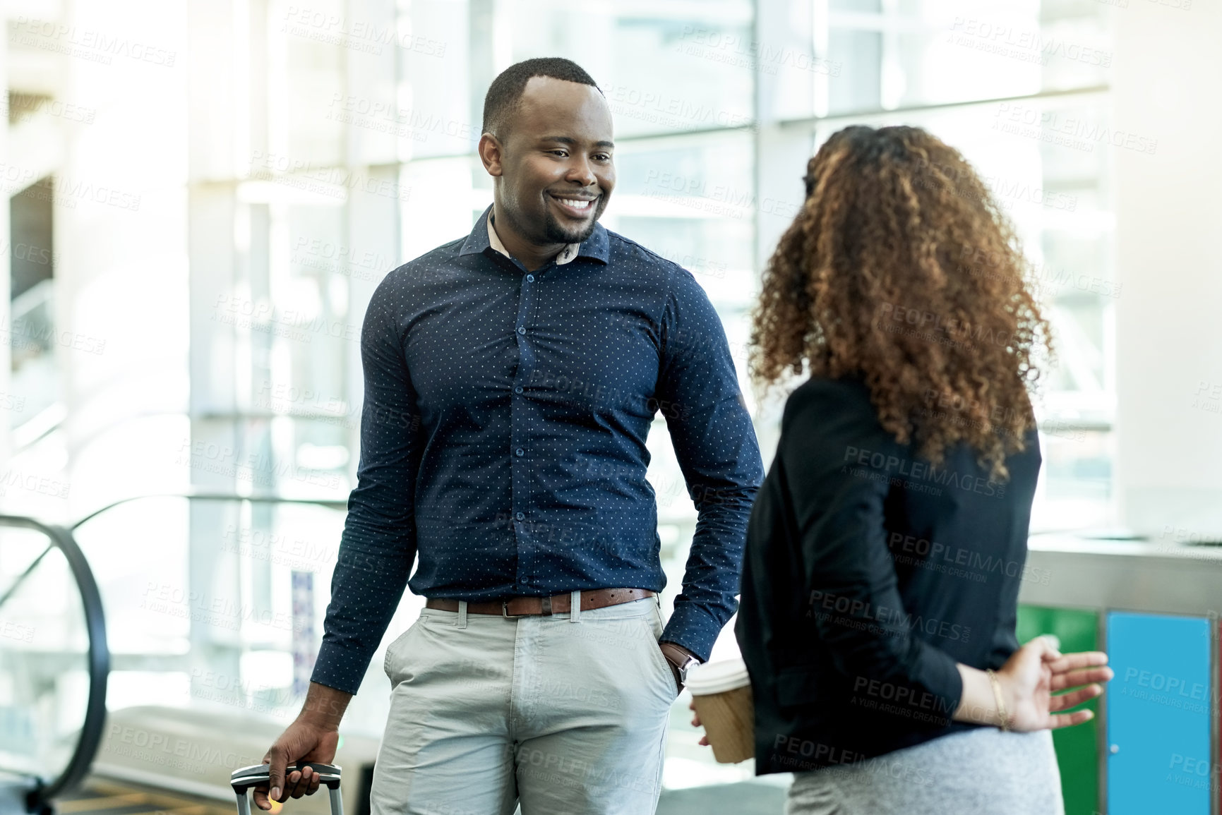 Buy stock photo Office, lobby and African business people in discussion with suitcase for conference, seminar and convention. Modern building, professional and man and woman in conversation, meeting and networking