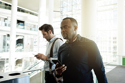 Buy stock photo Business people, phone and thinking in airport for travel, international collaboration and contact. Corporate team, bag and tech in terminal for trip planning, booking confirmation or flight schedule