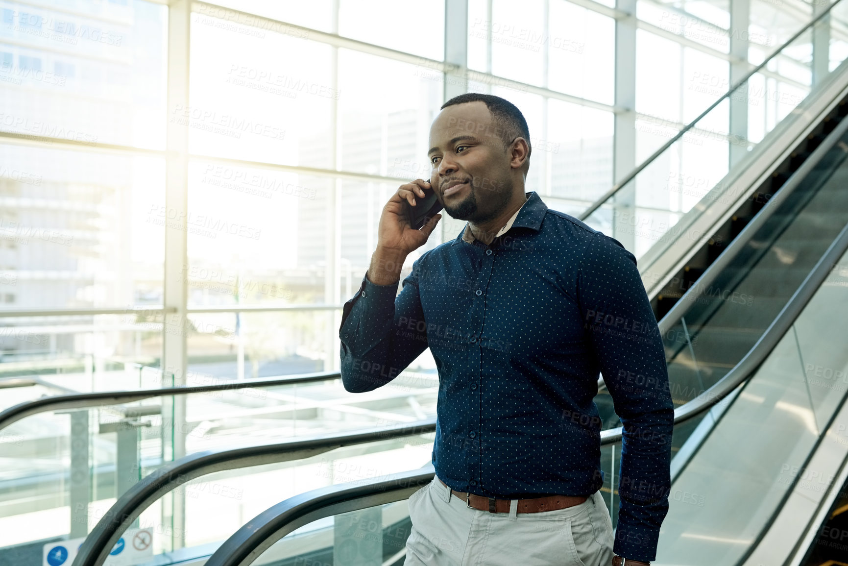 Buy stock photo Phone call, airport and business man on escalator for commute, travel and arrival in lobby. International trip, conference and person on stairs with smartphone for contact, flight schedule and chat