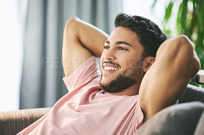 Buy stock photo Happy, home and man on sofa daydreaming for rest, chilling and comfortable on weekend. Living room, relax and person on couch smile for carefree, peace and satisfied for vacation, break and holiday