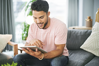 Buy stock photo Happy man, sofa or browsing decor with tablet for furniture, new interior or DIY tips in living room at home. Casual, male person or user scrolling on technology with smile for online store or design