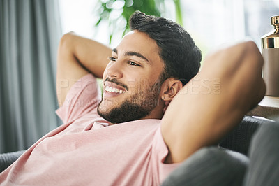 Buy stock photo Happy, home and man on sofa for rest, chilling and comfortable on weekend. Living room, thinking and person on couch with smile for carefree, daydreaming and satisfied for relaxing, break and calm