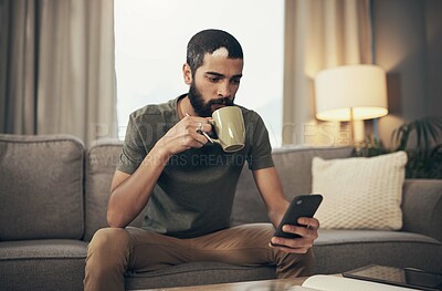 Buy stock photo Weekend, phone and man on sofa with coffee for social media, online post and internet in home. Apartment, relax and person with drink on smartphone for reading ebook, website news and connection