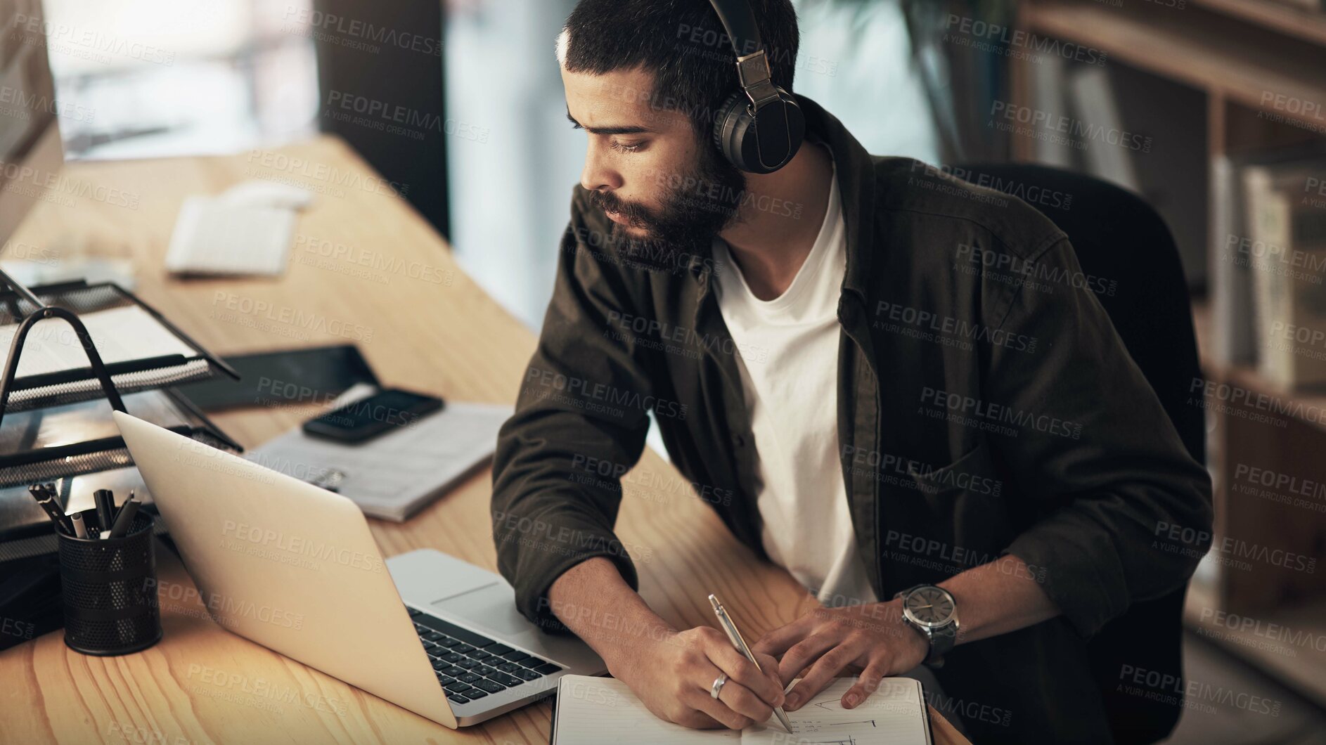 Buy stock photo Creative, man and thinking with laptop, notebook and video editor with night and headphones for project. Content creation, deadline and person with idea, post production or design process with music