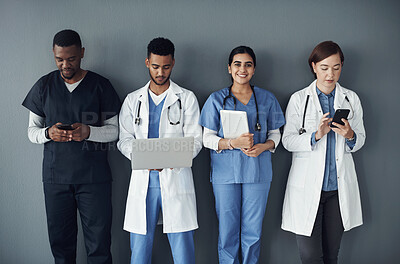 Buy stock photo Doctor, nurse and teamwork or planning on tech for medical research, workflow and wall background. Portrait of healthcare worker, group or staff on laptop, tablet and phone for internship opportunity
