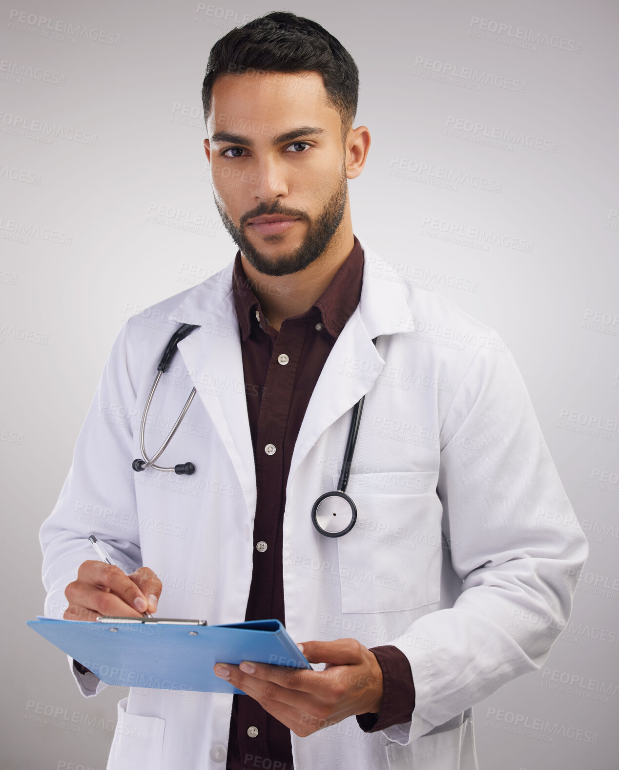 Buy stock photo Doctor, studio portrait and man with paperwork for patient report, consultation notes and test results. Male medical worker, clipboard and checklist for surgery with healthcare and admin on backdrop