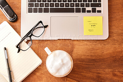 Buy stock photo Top view, stationary and laptop on table with coffee in morning for daily routine to start studying for test. Caffeine beverage, desk and technology for internet, search and journal for notes on exam