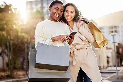 Buy stock photo Portrait, women and typing on smartphone for online shopping, sale or retail together outdoor by mall. Happy people, friends and cellphone for ecommerce, discount and deal for fashion or clothes