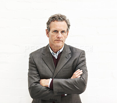 Buy stock photo Portrait of a businessman, isolated on a white background. A mature male executive looking confident about business in an office or studio