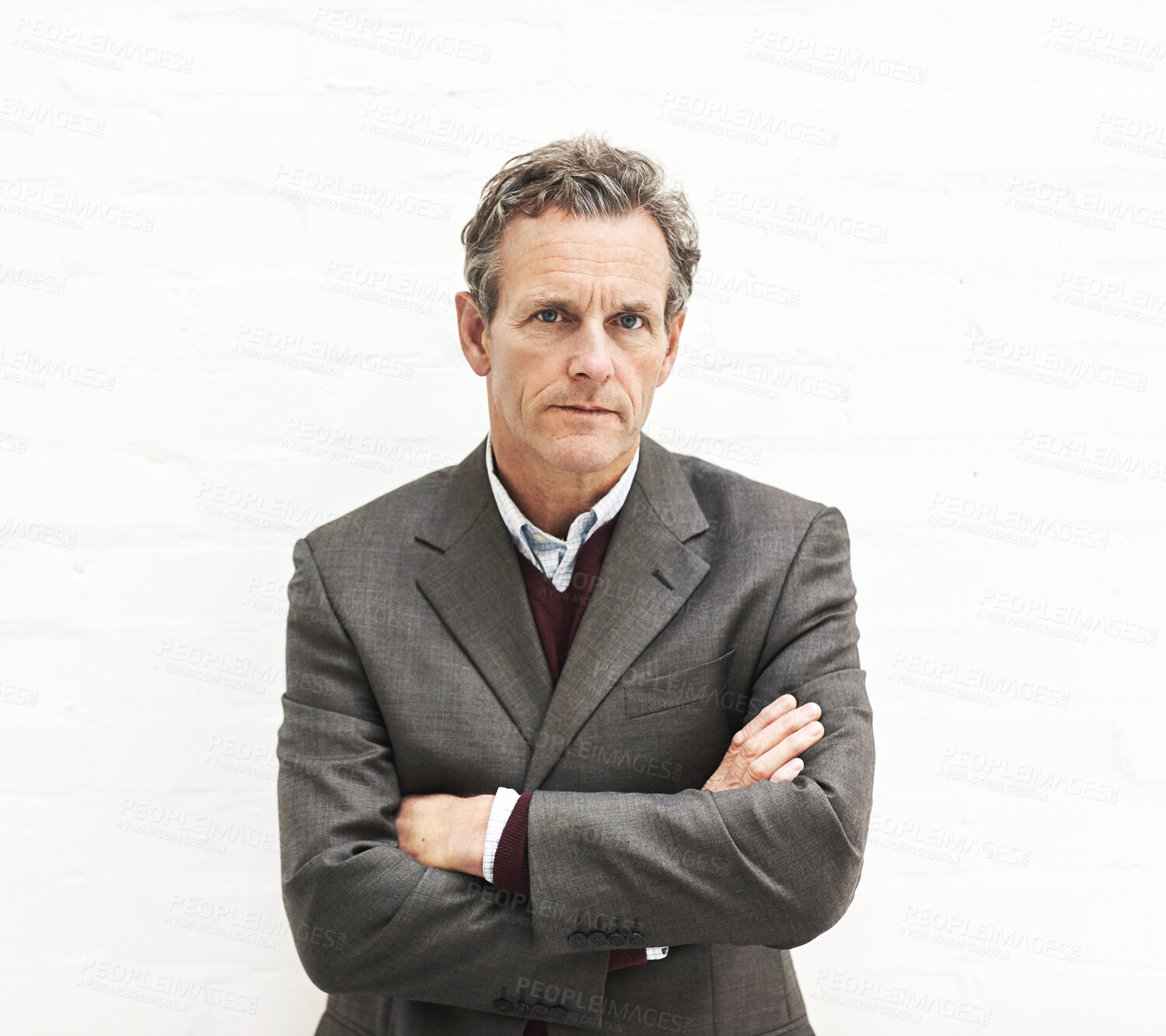 Buy stock photo Portrait of a businessman, isolated on a white background. A mature male executive looking confident about business in an office or studio