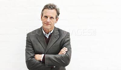 Buy stock photo Portrait of a businessman, isolated on a white background. A mature male executive looking confident about business in an office or studio