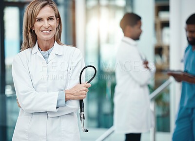 Buy stock photo Cardiology, stethoscope and proud doctor in portrait for medical wellness, trust and innovation with lens flare. Hospital executive healthcare worker woman smile for career motivation or heart health