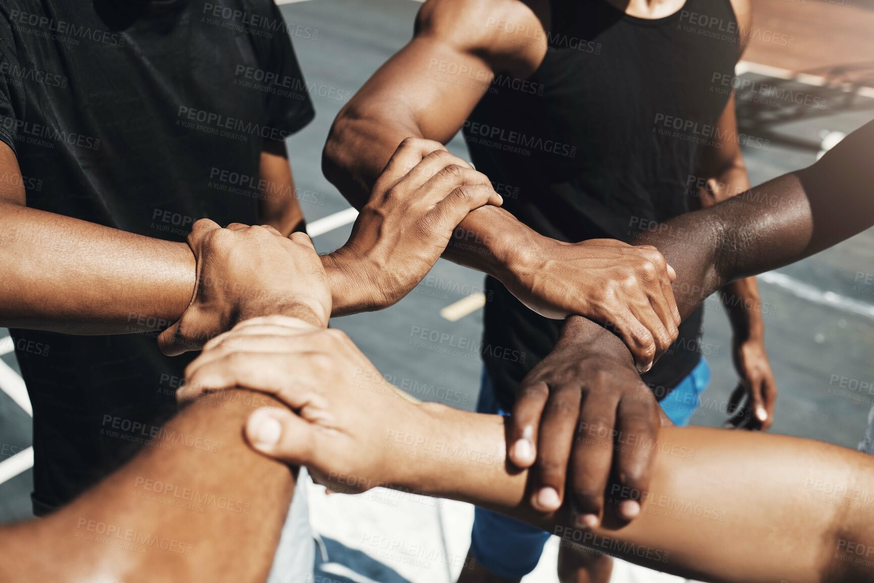 Buy stock photo Diversity team, friends and basketball holding hands for trust, partnership or community goal on New york basketball court. Motivation, support or sports unity for fitness, training or health workout