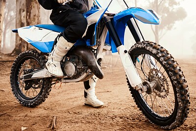 Buy stock photo Motorcycle, person legs and sports in forest with training for competition, nature with action and helmet. Extreme, adrenaline and exercise, athlete and transport with dirt bike, freedom and travel