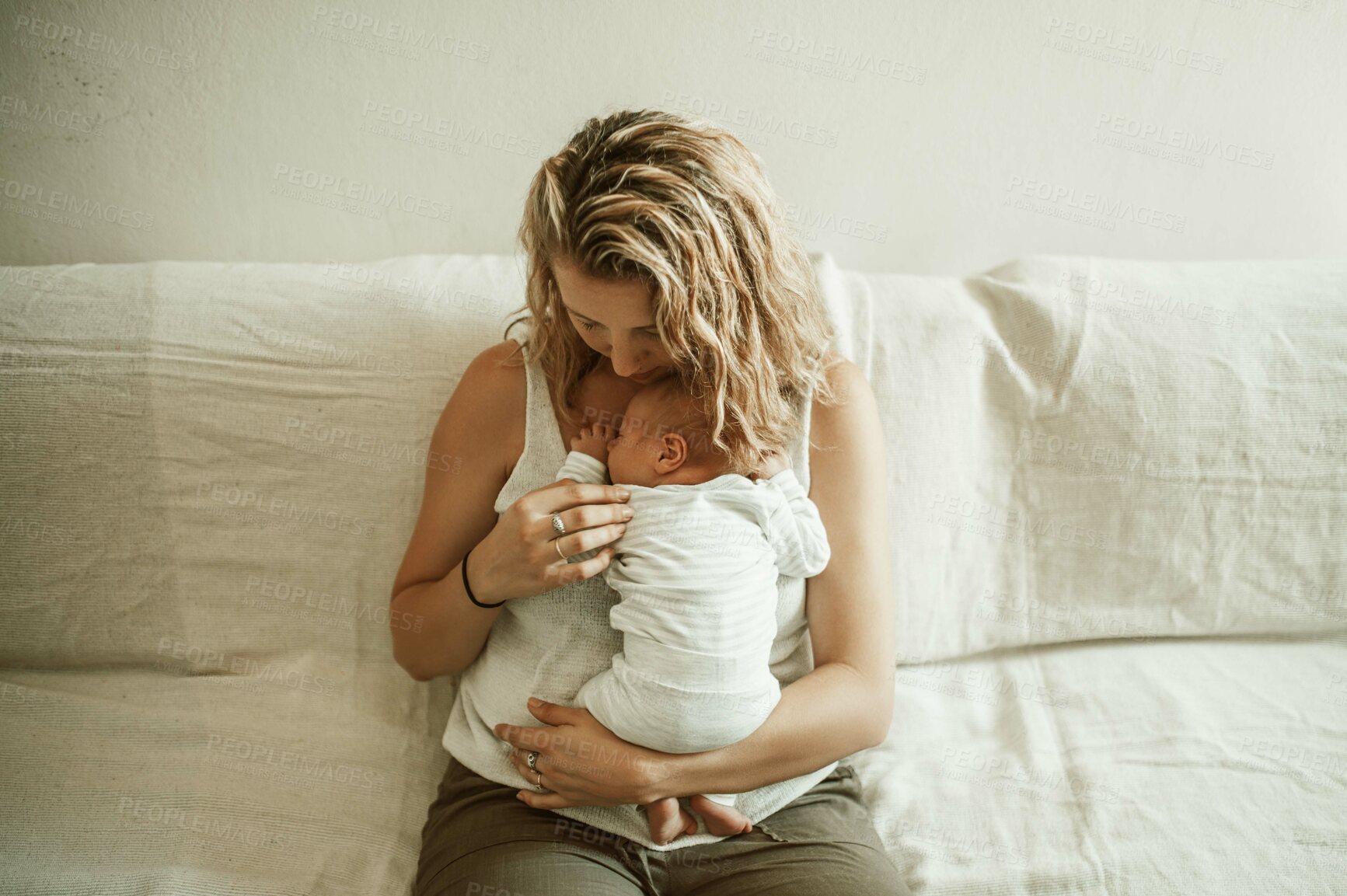 Buy stock photo Mother, baby sleep and living room in a home with parent care, love and hug on a sofa. Rest, mama and newborn child in a family house with mom and young kid together with youth on a lounge couch