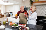 Cooking, love and senior couple in a kitchen with care, fun and bonding at home. Health, food and hungry old people with vegetables for meal prep, brunch or detox, weight loss or vegan lunch salad 
