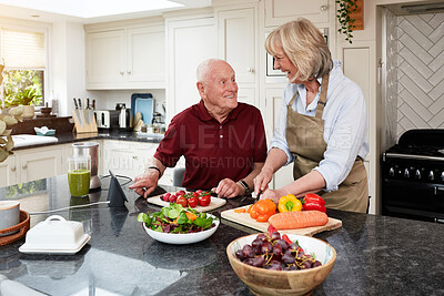 Buy stock photo Senior couple, cooking and vegetables in kitchen with smile, helping hand or nutrition for wellness in home. Elderly woman, old man and prepare food for diet, health and lunch in house for retirement