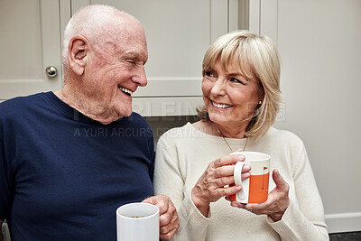 Buy stock photo Senior, couple and coffee in kitchen with smile for retirement, break or beverage in the morning at home. Elderly, man and woman with tea for breakfast, happiness and bonding in house or apartment