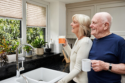 Buy stock photo Coffee, happy and elderly couple in kitchen in home together in the morning for conversation, love and connection in retirement. Tea, smile and senior man and woman enjoying drink in mug or thinking