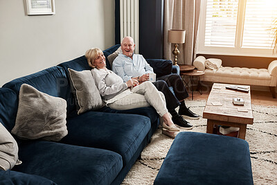 Buy stock photo Relax, love and portrait senior couple on a sofa for bonding in the living room at modern home. Happy, smile and elderly man and woman in retirement talking together in the lounge of family house.
