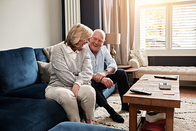Buy stock photo Smile, relax and retirement with an elderly couple on a sofa in the living room of their home for conversation. Love, smile or wellness with a happy senior man and woman talking in their apartment
