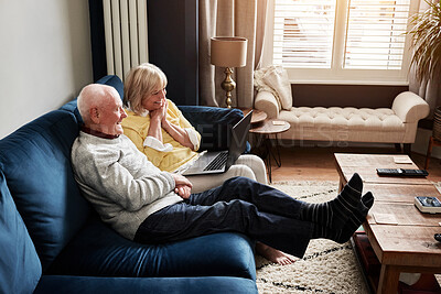 Buy stock photo Laptop, wow and retirement with a senior couple on a sofa in the living room of their home for entertainment. Computer, smile or news with a happy elderly man and woman streaming in an apartment