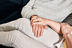 Senior couple holding hands for love, support and trust for gratitude, empathy and care in retirement at home. Closeup, partner and helping hand for loyalty, kindness and relax together in marriage