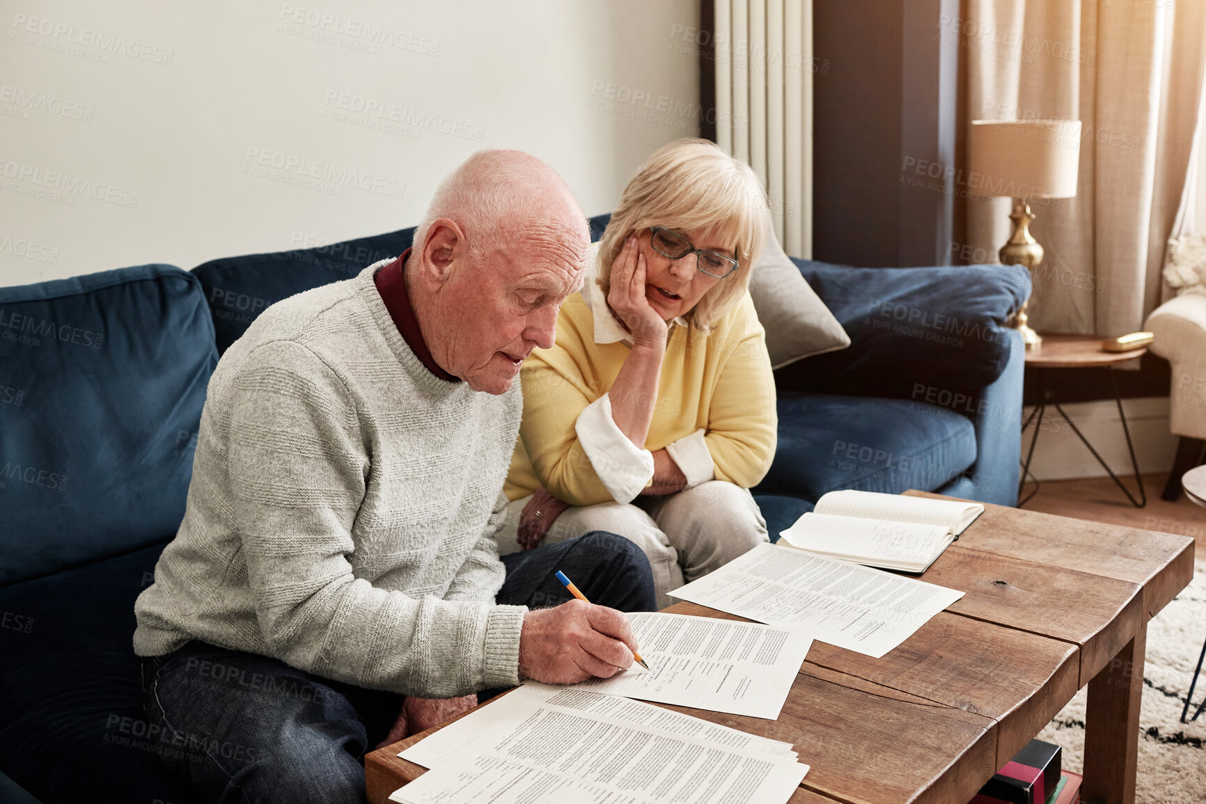 Buy stock photo Senior, couple and writing documents in home for planning budget, retirement assets and sign legal contract for insurance policy. Man, woman and reading paperwork, finance information and investment 