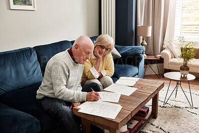Buy stock photo Senior couple, retirement and writing documents of investment report, financial assets or sign legal contract of insurance policy. Man, woman and paperwork for budget, pension savings or loan at home