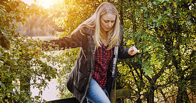 Buy stock photo Countryside, morning and woman by fence walking for wellness, fresh air and relax outdoors. Trees, spring  and person in field, meadow and farm for calm, peace and freedom in natural environment