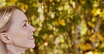 Nature, happy and profile of mature woman by trees with positive, good and confident attitude. Smile, outdoor and female person from Australia in an outdoor field, park or garden for fresh air.