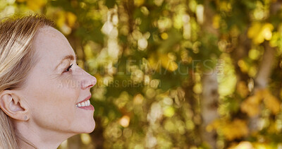 Buy stock photo Nature, thinking and profile of mature woman by trees with positive, good and confident attitude. Smile, happy and female person from Australia in an outdoor field, park or garden for fresh air.