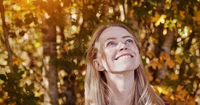 Buy stock photo Happy, thinking and woman in fall with nature, freedom and relax outdoor in garden or backyard. Autumn, trees and vision of forest leaves or person in park on vacation, holiday or sunshine in morning