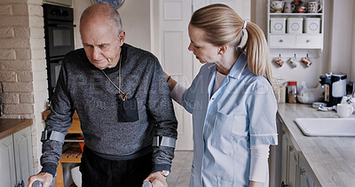 Buy stock photo Medical, help and nurse with senior man in a nursing home kitchen with crutches and consultation. Healthcare, career and female caregiver with elderly male patient in retirement at modern house.