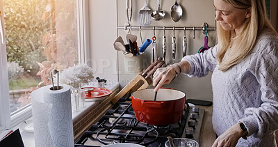 Buy stock photo Woman, cooking and stove or pot food for warm winter meal, stew dinner or smile in kitchen. Female person, gas appliance or prepare nutrition eating as soup diet for fresh taste, love home or healthy