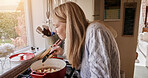 Woman, smell and cooking at stove in kitchen for warm meal, stew dinner or pot lunch. Female person, gas appliance and prepare nutrition eating as soup diet for fresh taste, hobby recipe or healthy