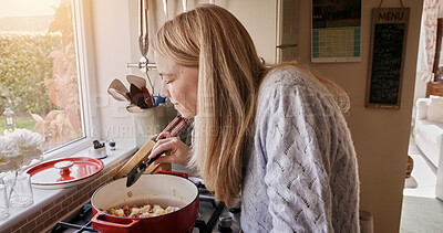 Buy stock photo Woman, smell and cooking at stove in kitchen for warm meal, stew dinner or pot lunch. Female person, gas appliance and prepare nutrition eating as soup diet for fresh taste, hobby recipe or healthy