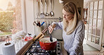 Woman, cooking and pot stove in kitchen for warm food, stew dinner or vegetable hunger. Female person, gas appliance and prepare nutrition eating as soup diet for fresh taste, hobby dish or healthy