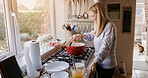 Woman, cooking and food in stove pot as winter warm recipe, stew dinner in kitchen. Female person, gas appliance heat or prepare nutrition eating as soup diet or fresh taste,  vitamin dish for health