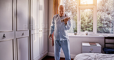 Buy stock photo Home, dumbbells and senior man with exercise, fitness and wellness with retirement, lifting weights and healthy. Elderly person, apartment and old guy with workout for power, mobility and activity
