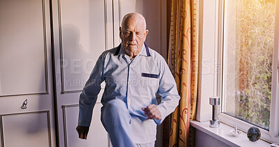Buy stock photo Nursing home, fitness and senior man in a room for recovery, exercise or lifting legs physio. Physiotherapy, training and elderly male person with body healing workout in rehabilitation house bedroom