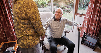 Buy stock photo Old man, talking and relax in home with caregiver in retirement with walking stick and support. Senior, person and conversation with woman in apartment, living room and house with care and discussion