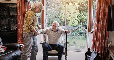 Buy stock photo Senior, couple and help with walking stick for care, support or assistance on sofa in living room of home. Elderly, woman or man with disability or cane in lounge of retirement with love and recovery
