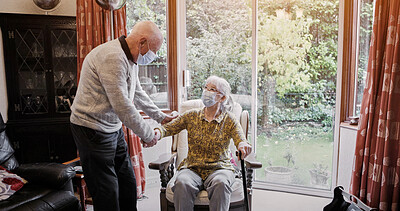 Buy stock photo Senior, couple or support with walking stick for sick, help or assistance on sofa in living room of home. Elderly, man or woman with disability, mask or covid in retirement with love and recovery