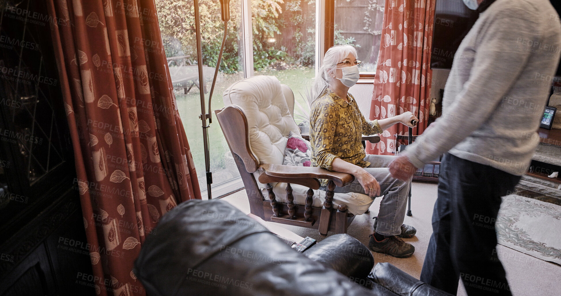 Buy stock photo Senior, couple and face mask in living room for virus protection or sick, compliance or health care. Old people, pandemic management for illness cooperation in home or marriage, empathy or quarantine