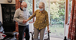 Senior, couple and help with walking stick for care, support or assistance on sofa in living room of home. Elderly, man or woman with disability or cane in lounge of retirement with love and recovery