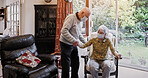 Senior, couple and help with walking stick for care, support or assistance on sofa in living room of home. Elderly, man or woman with disability or cane in lounge of retirement with love and recovery