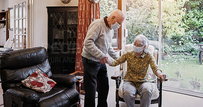 Buy stock photo Senior, couple or help and walking stick with mask, support or assistance on sofa in living room of home. Elderly, man or woman with disability or covid in lounge of retirement with love and recovery