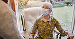 Senior, woman and living room or mask protection for virus husband, compliance for health care. Old people, pandemic management for illness cooperation in home for marriage, empathy or quarantine