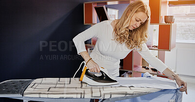 Buy stock photo Woman, housewife and ironing of garment in living room for housekeeping, cleaning or washing. Female person, working or domestic chore by iron, appliance and electricity for, neat, fresh and clothes
